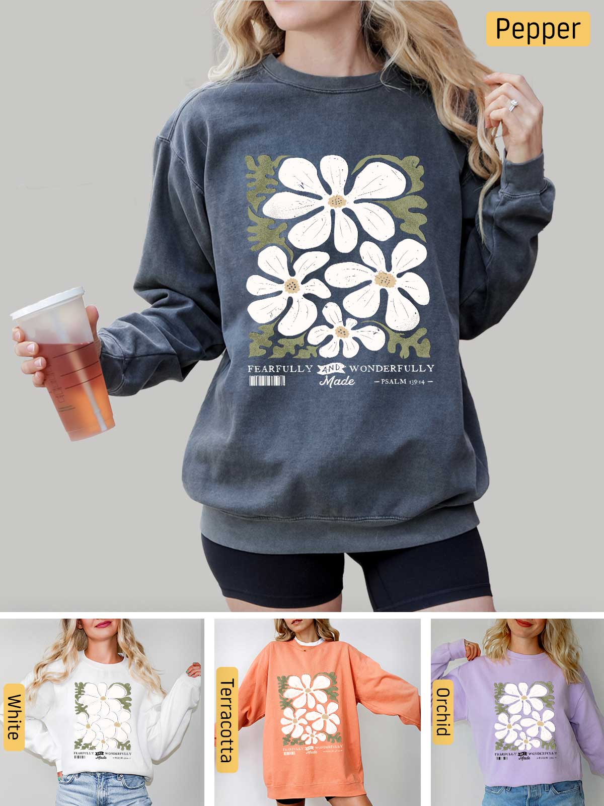 a woman wearing a sweatshirt with flowers on it