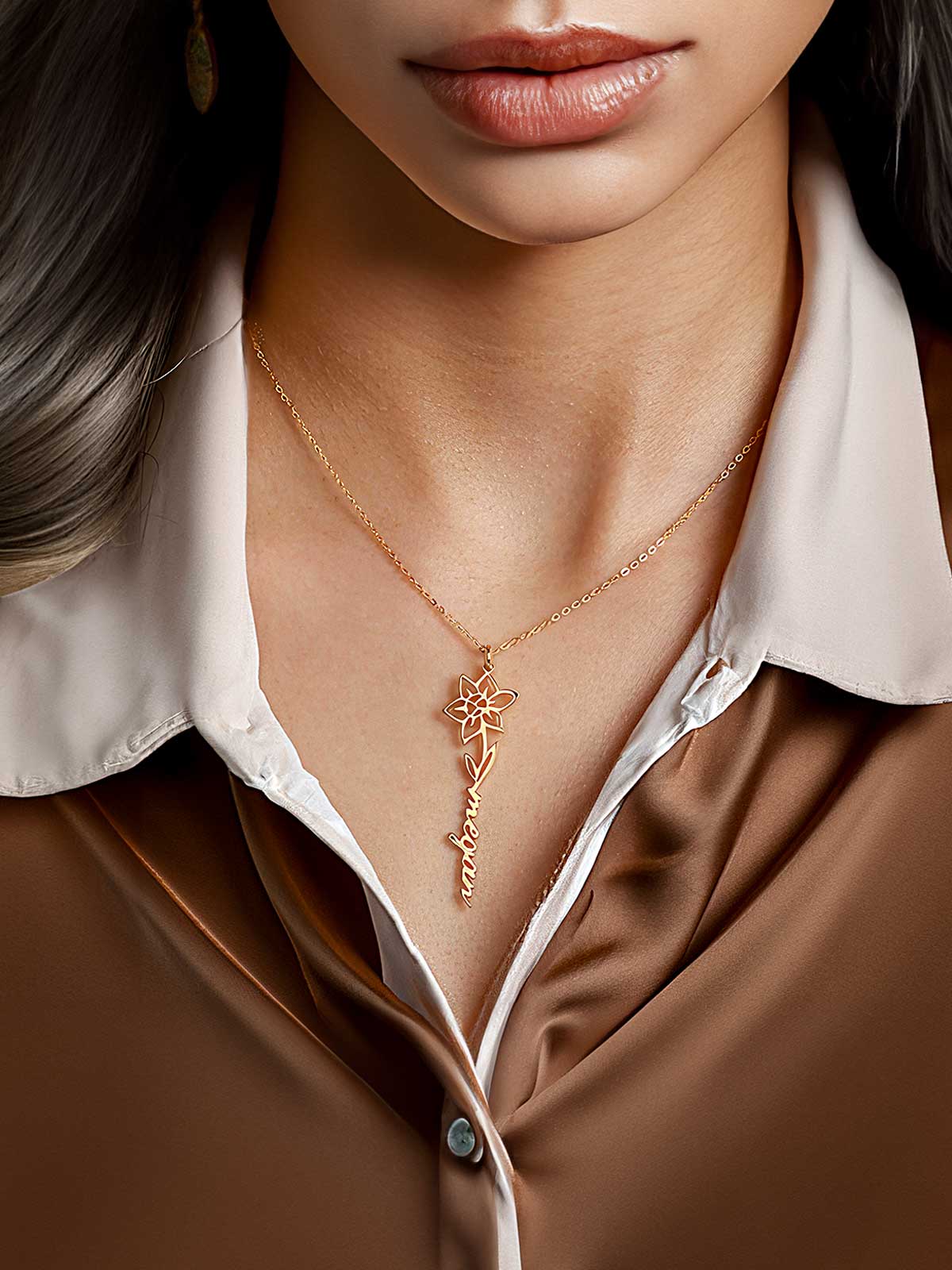 a woman wearing a necklace with a cross on it