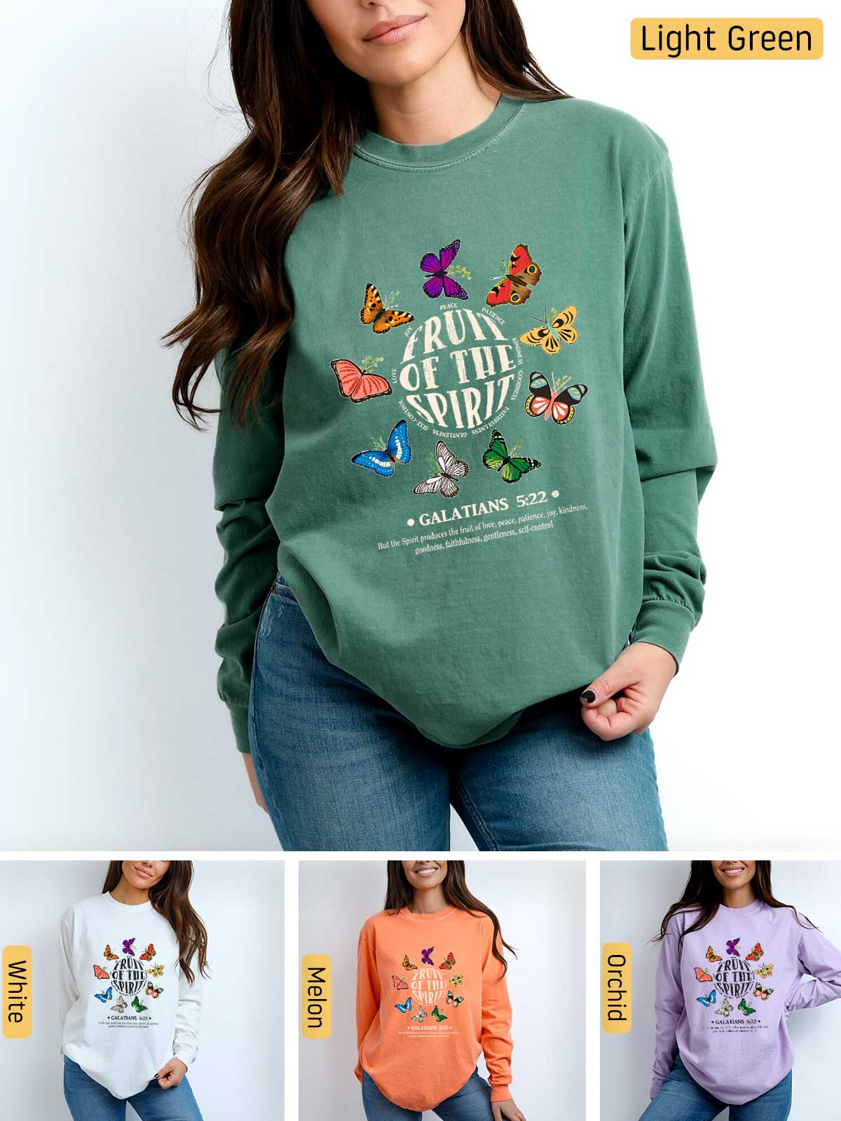 a woman wearing a green sweatshirt with butterflies on it