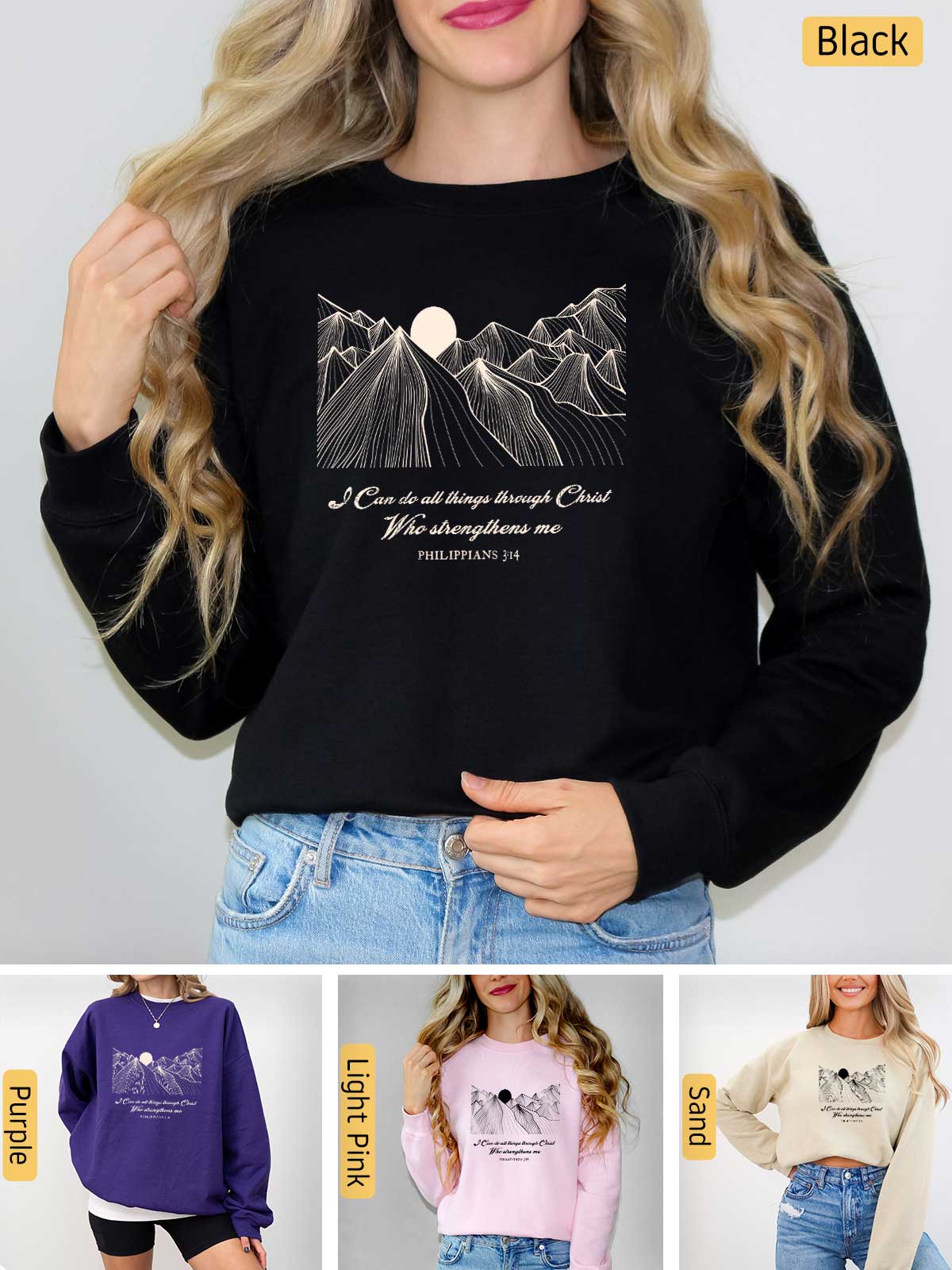 a woman wearing a black sweatshirt with a mountain scene on it