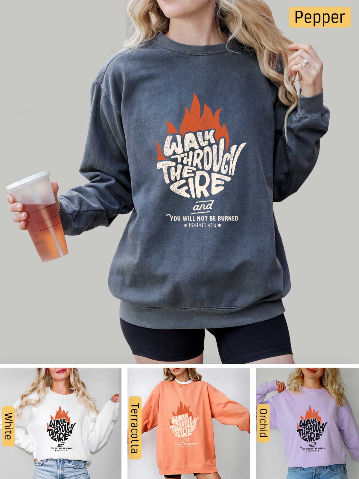 a woman wearing a sweatshirt with a fire graphic on it