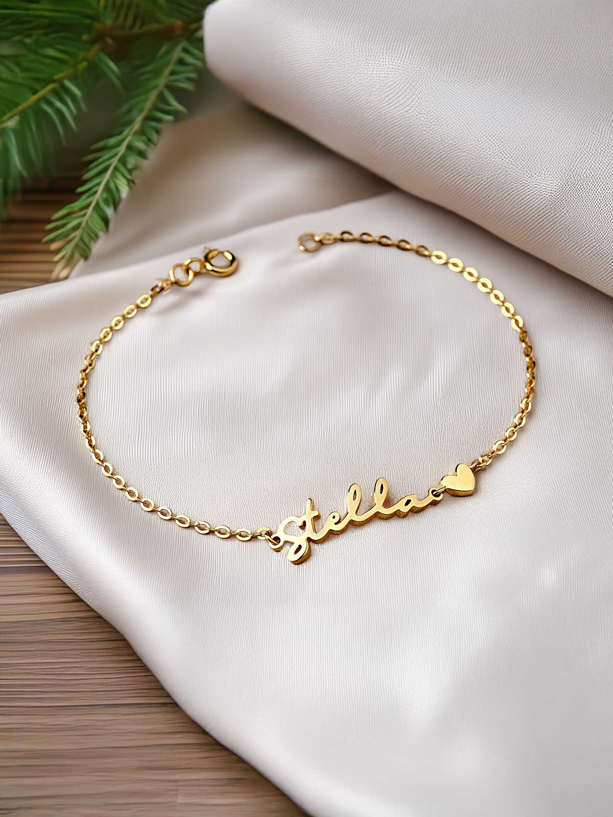 a gold bracelet with a name on it