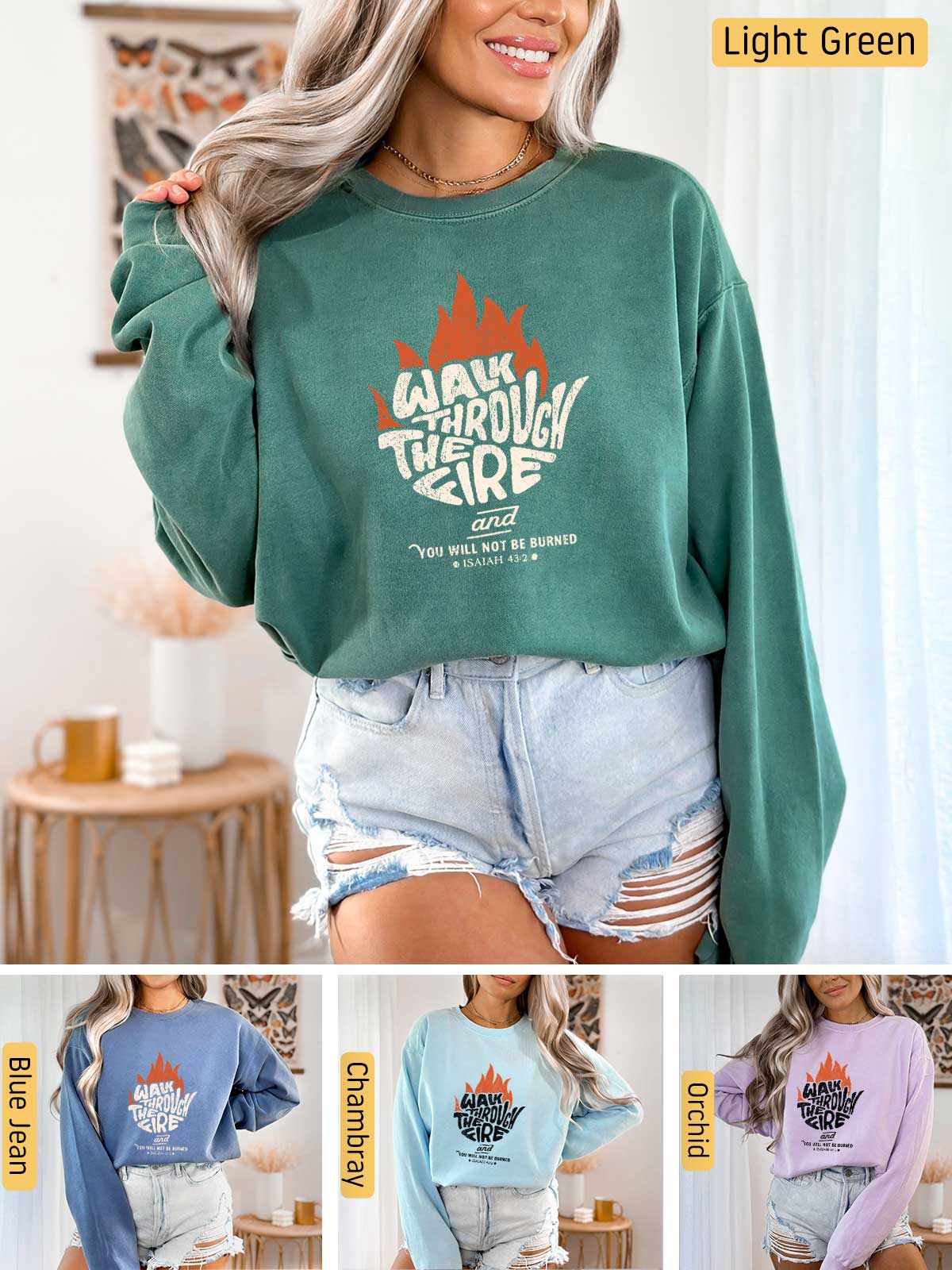 a woman wearing a green sweatshirt and denim shorts