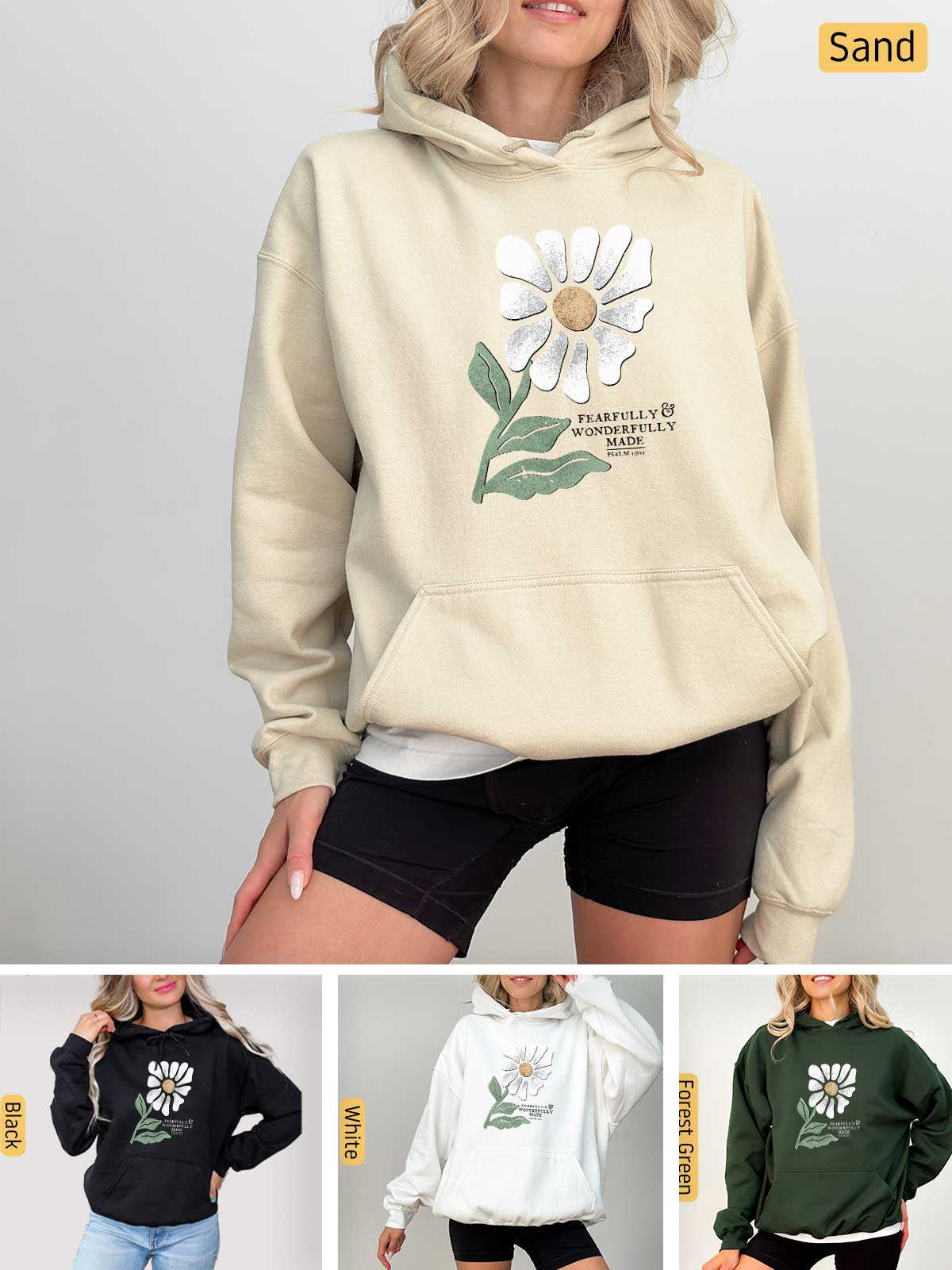 a woman wearing a sweatshirt with a flower on it