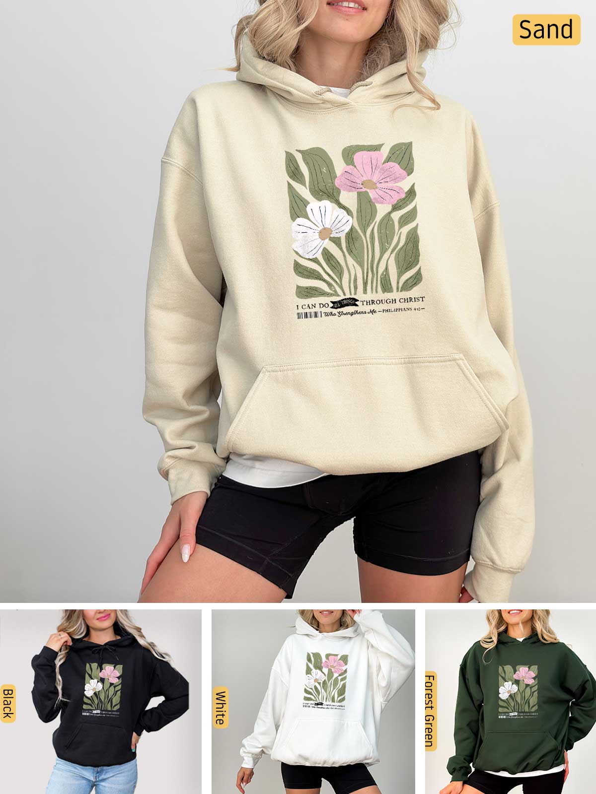 a woman wearing a sweatshirt with flowers on it