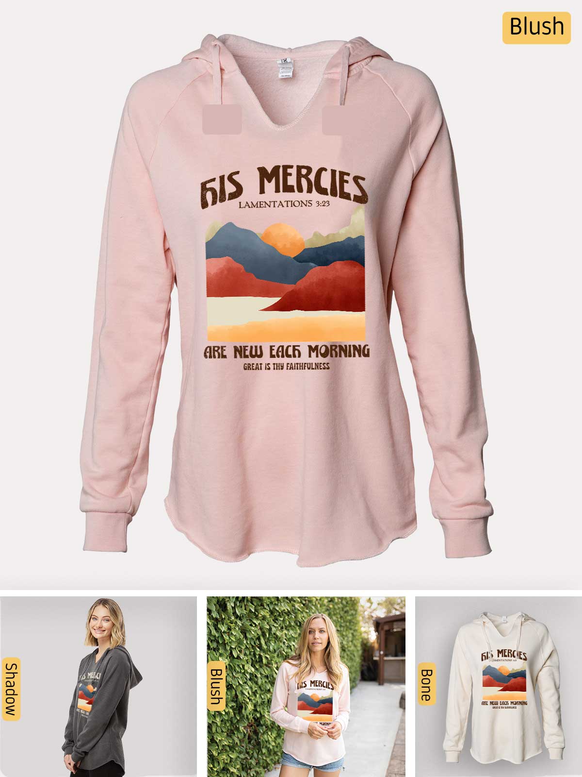 a pink sweatshirt with a picture of mountains on it