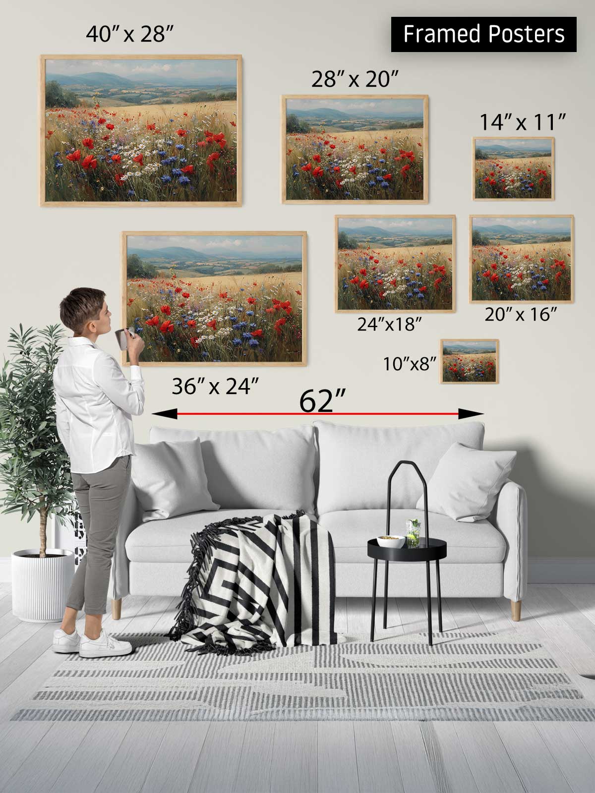 The image is a collage of framed posters of various sizes, including a large landscape painting and smaller framed artworks, displayed on a wall in a living room setting.