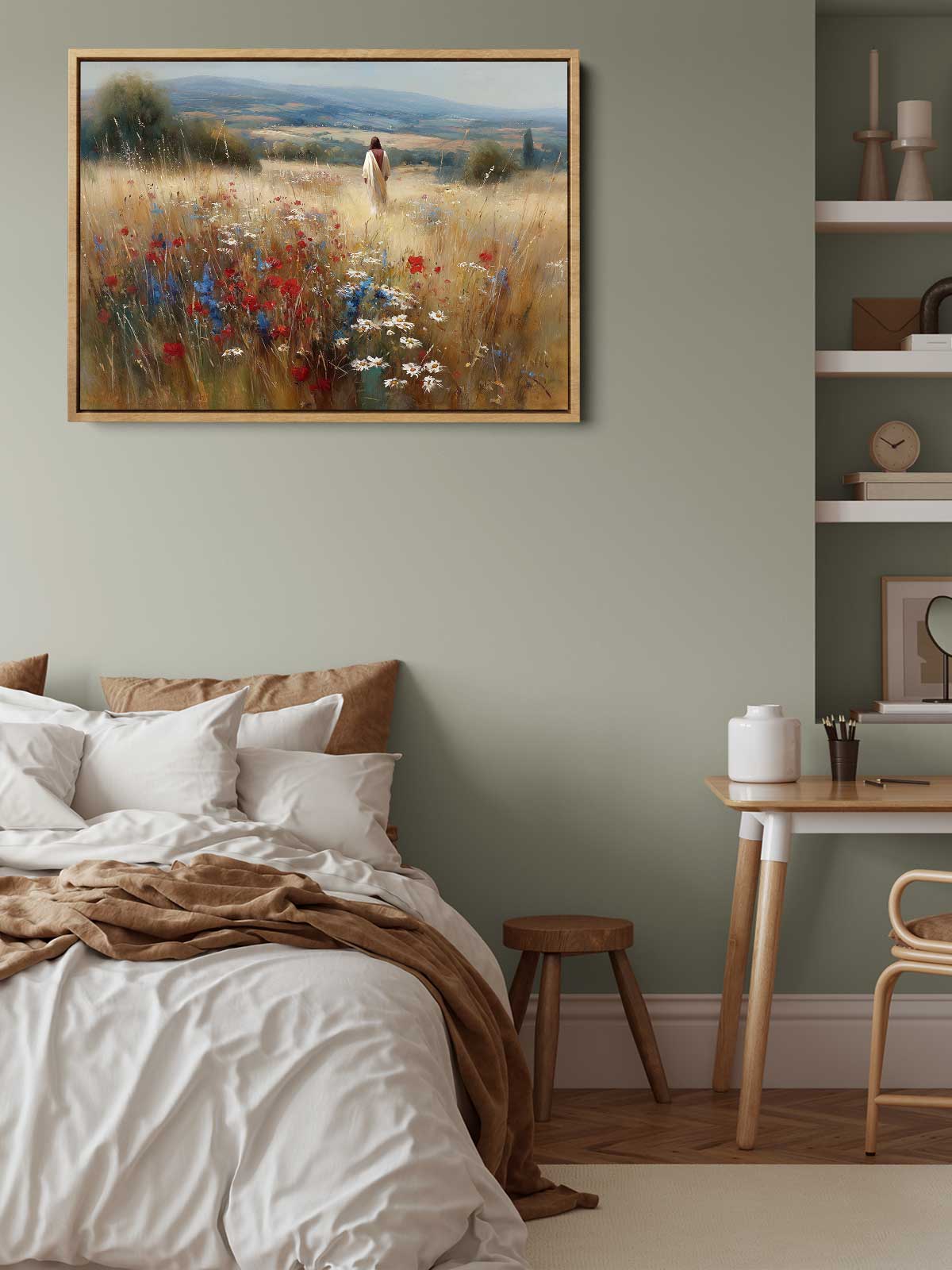 a serene bedroom scene with a bed, a wooden table, and a painting of a field with flowers hanging above it.