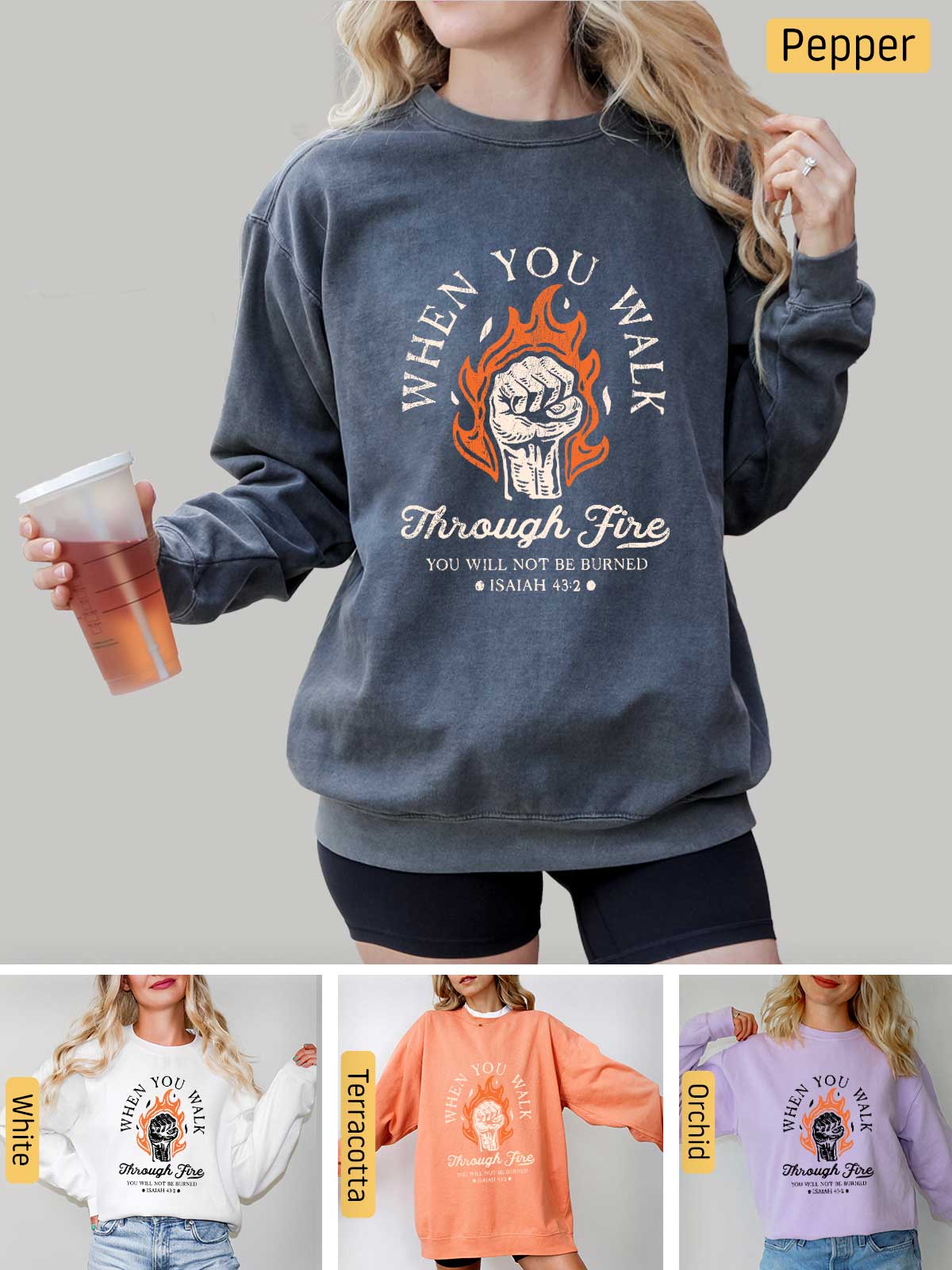 a woman wearing a sweatshirt that says when you drink through fire