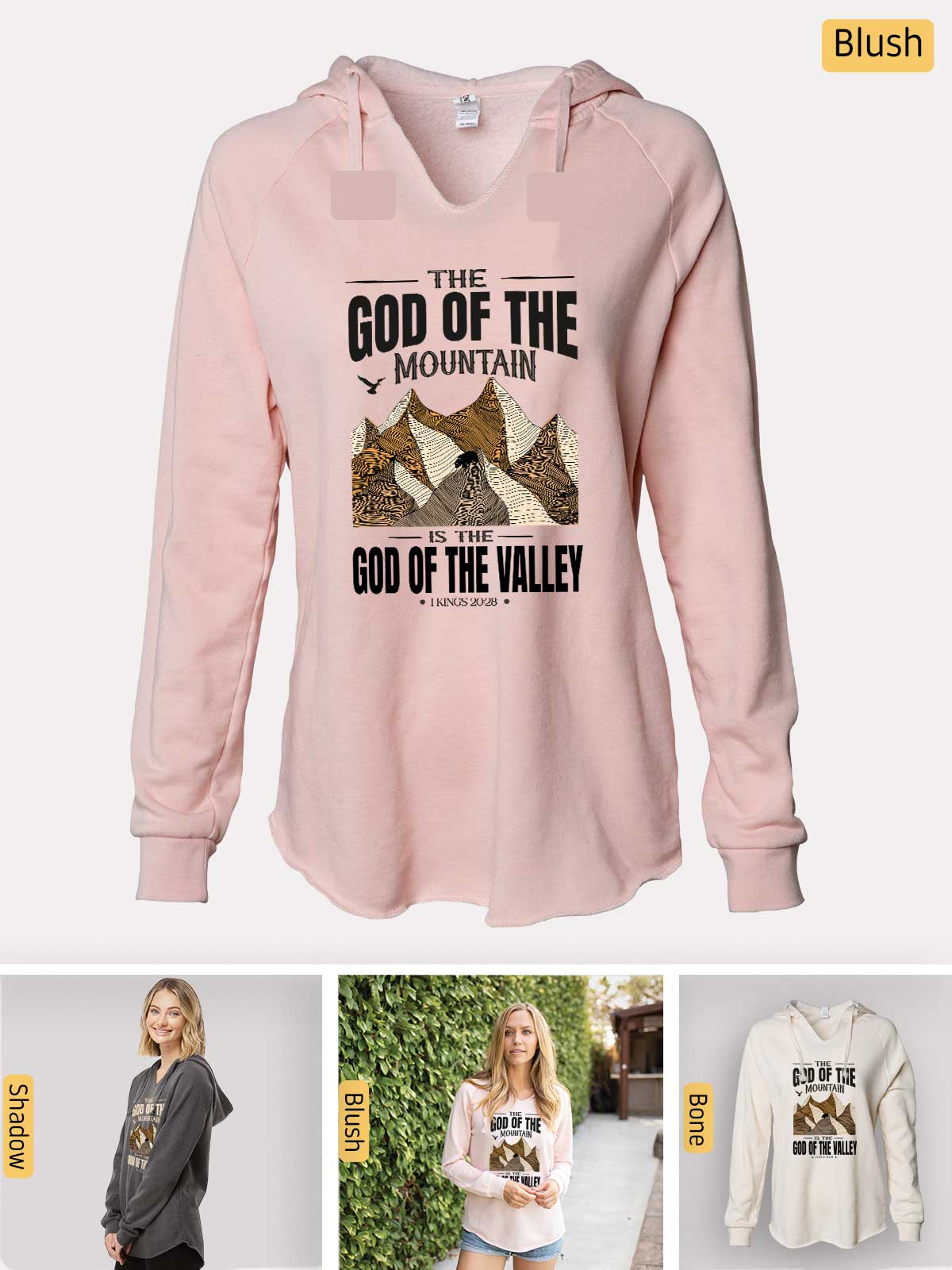 a woman wearing a pink hoodie with a picture of a mountain on it