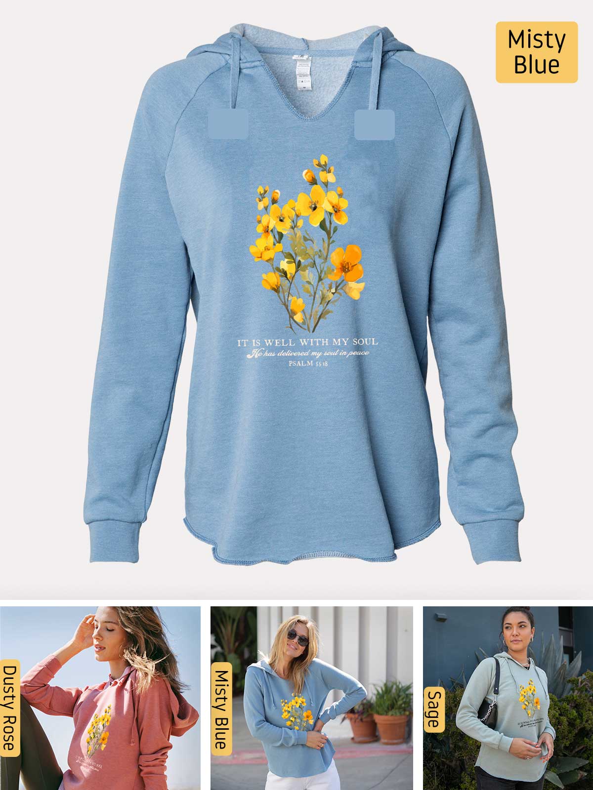 a woman wearing a blue sweatshirt with yellow flowers on it