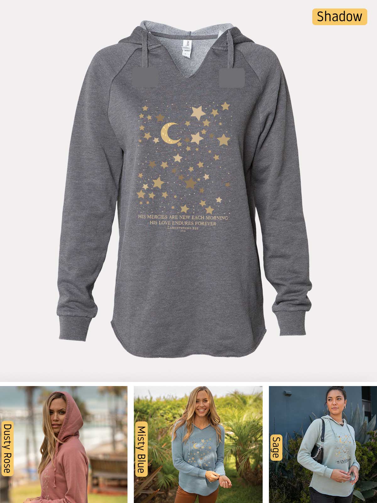 a woman wearing a hoodie with stars and moon on it