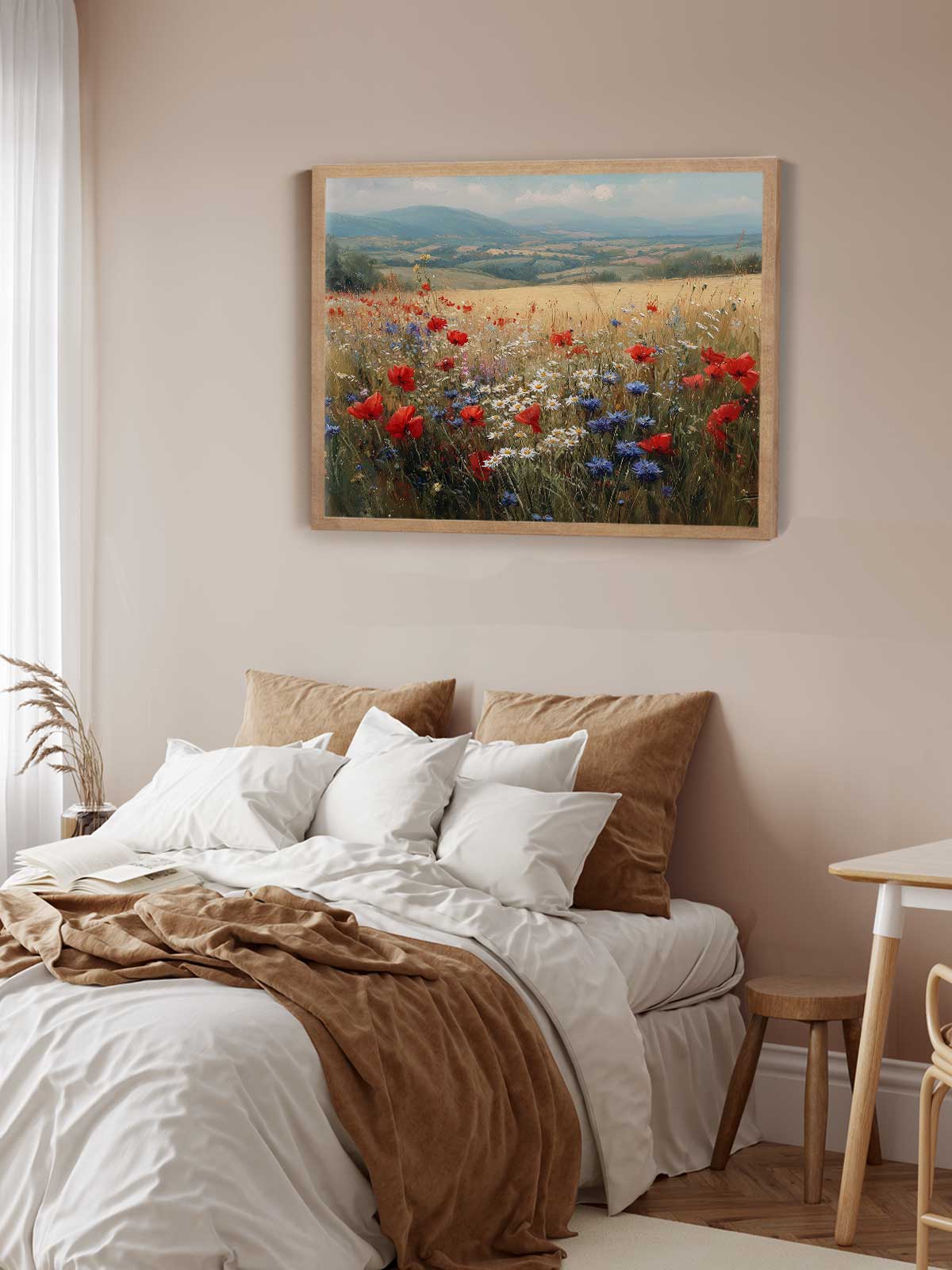 a serene bedroom scene with a bed adorned with white sheets and brown throw blankets, a wooden nightstand beside the bed, and a framed landscape painting hanging on the wall above the bed.