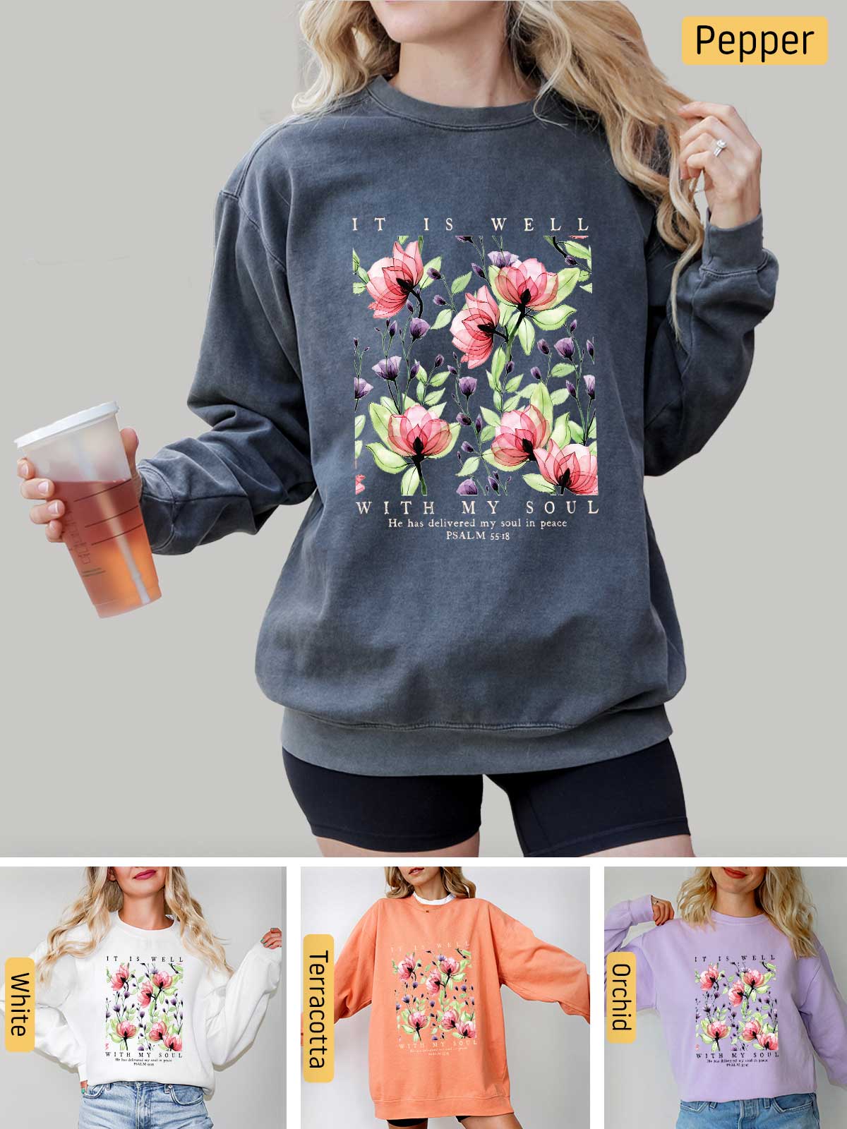 a woman wearing a sweatshirt with flowers on it