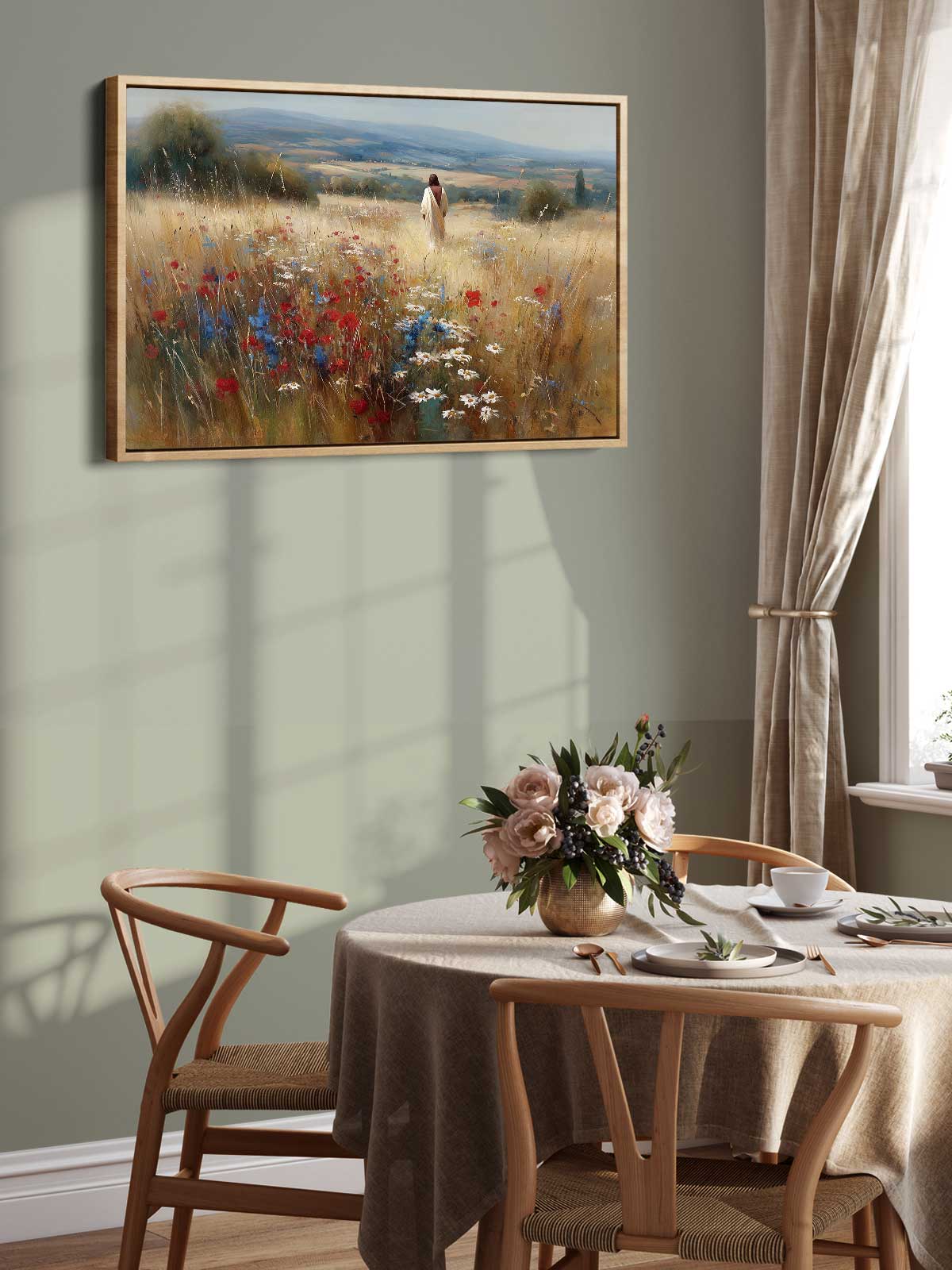 a dining room with a table set for two, a vase of flowers, and a painting of a woman walking in a field of flowers hanging on the wall above the table.