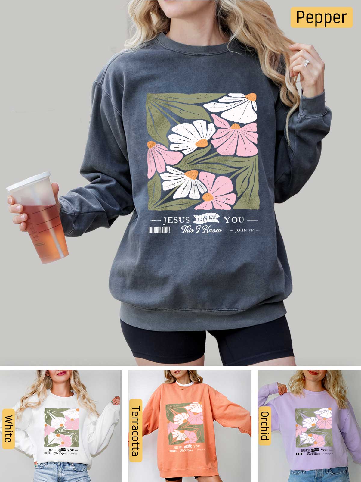 a woman wearing a sweatshirt with flowers on it